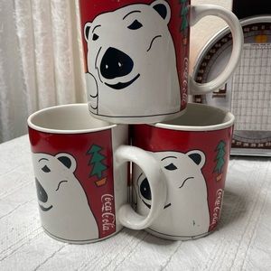Vintage Coca Cola coffee mugs.